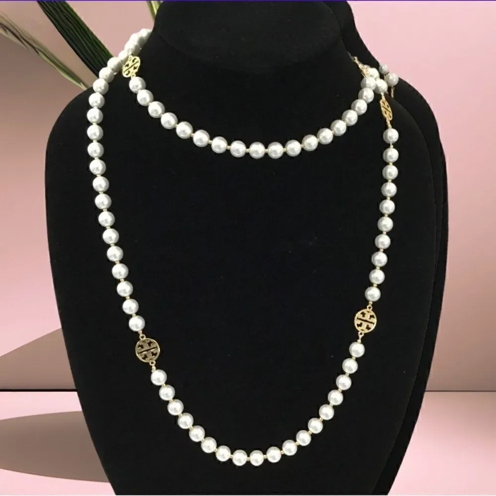 TORY BURCH PEARLS LOGO LONG NECKLACE